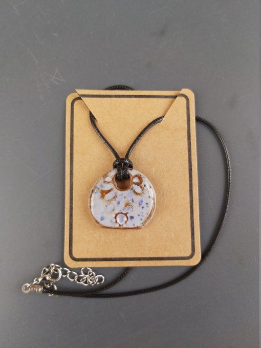 Pendentif soleil mauve céramique