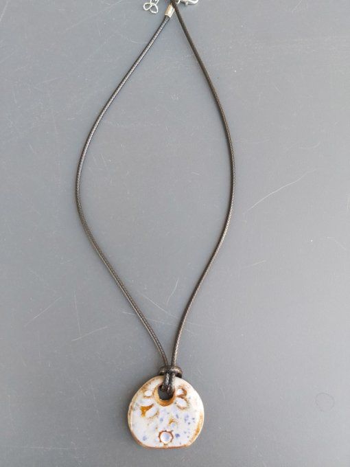 Pendentif soleil mauve céramique