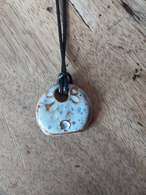 Pendentif soleil mauve céramique